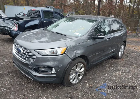 2022 Ford Edge Titanium z USA, uszkodzony, nr VIN 2FMPK4K90NBA35277